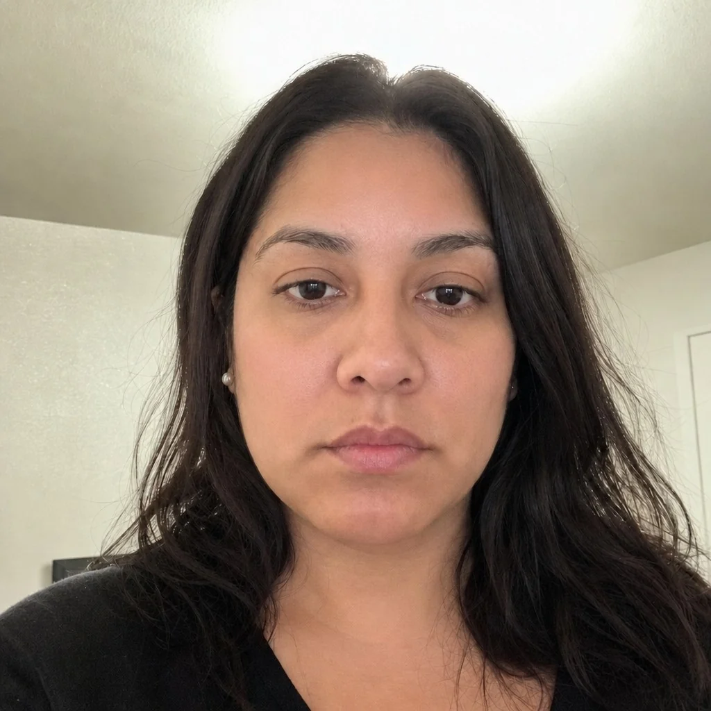 The same face with a cheek filler simulation applied by AI